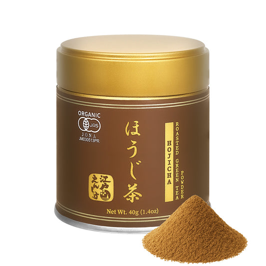 Hojicha powder in a brown resealable tin with a gold lid, shown with a small pile of the powder on a white background.
