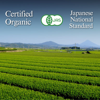 Rows of tea bushes in an open field with distant hills, the JAS mark, and text 'Certified Organic' and 'Japanese National Standard'.