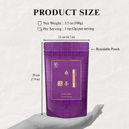 Product size guide for the Kuwacha mulberry leaf tea pouch held in a hand, marked 12 cm wide and 20 cm tall, 100g net weight and 1 tsp (2g) per serving, labelled resealable pouch.